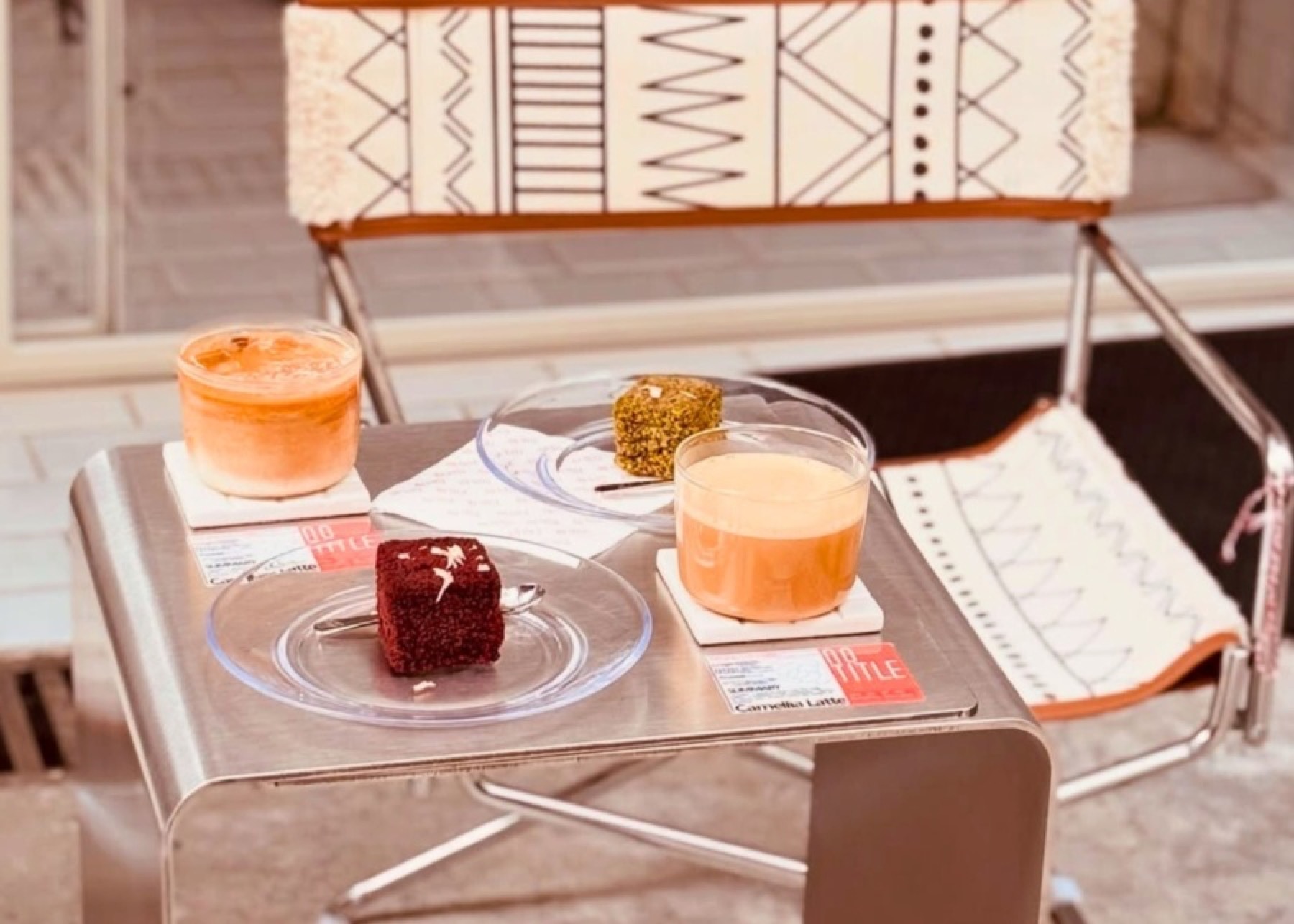 A colourful selection of No Title signature drinks and a small cake